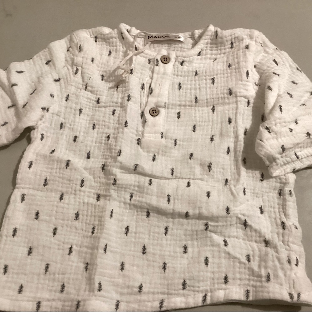 Size 6T white shirt with feathers design